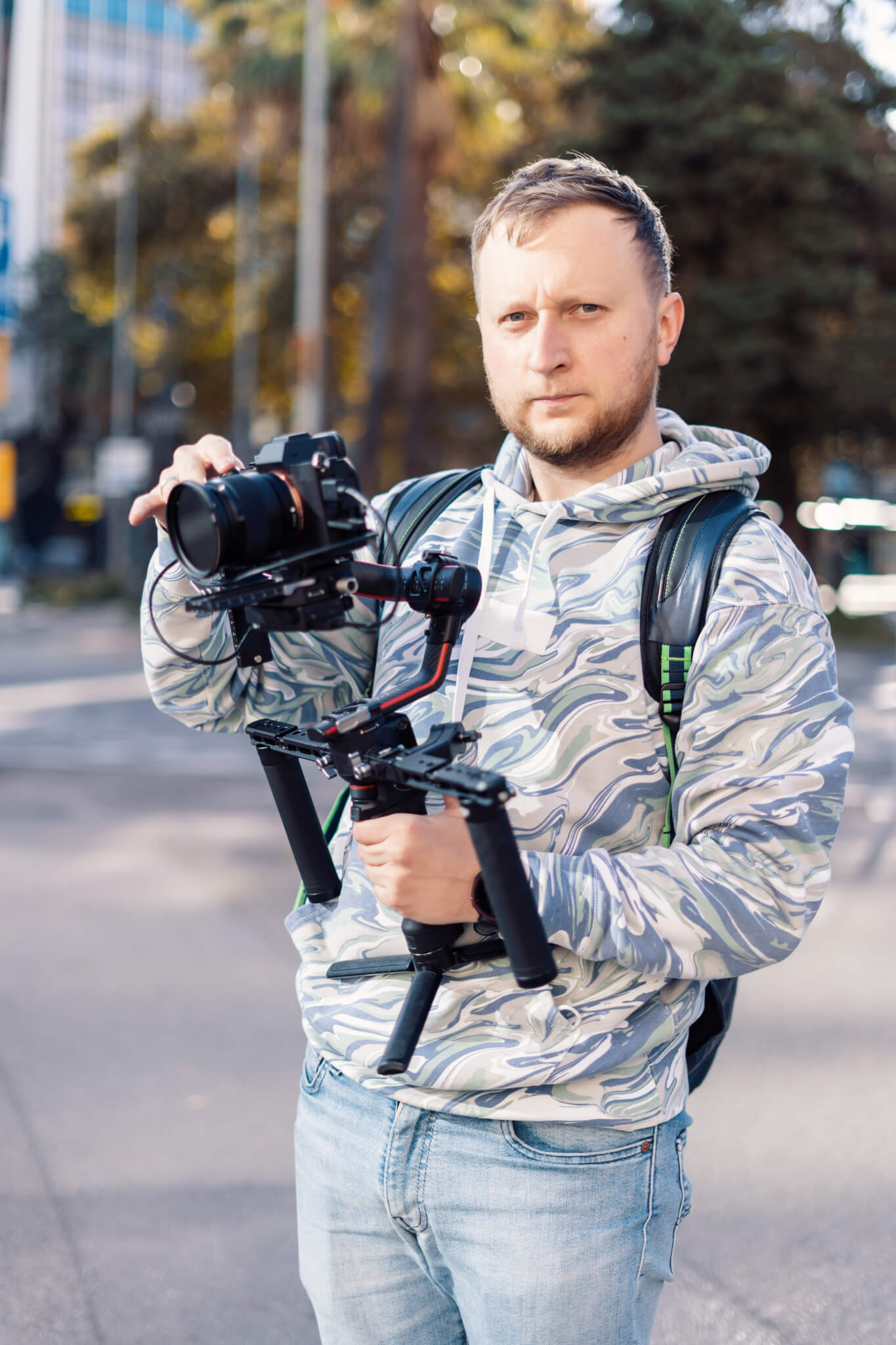professional-videographer-with-gimball-video-setup-during-shooting.jpg